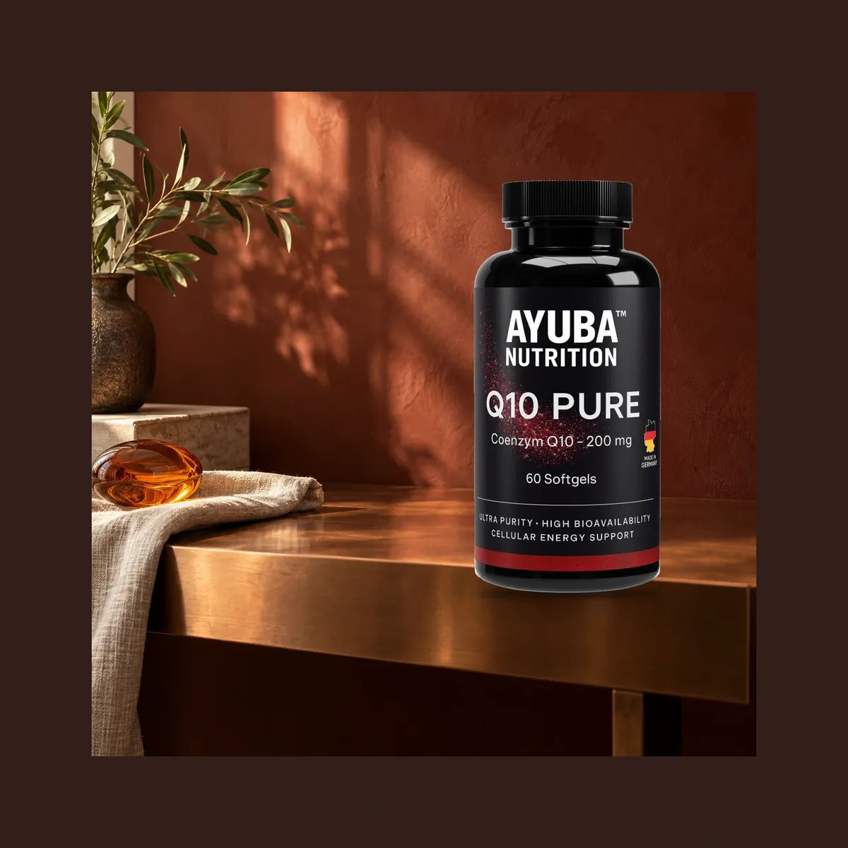 Q10 Pure auf einem Holztisch im Abendlicht